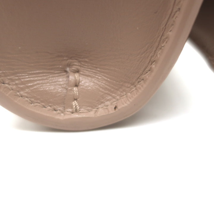 Alaia Simone Arabesque Studded Leather Clutch Sable