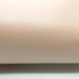 Alaia Simone Arabesque Studded Leather Clutch Sable