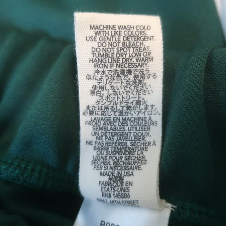THE GREAT side-stripe track pants in clover green and white, authentic pre-owned luxury activewear, size 0