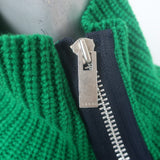 Authentic pre-owned Sacai asymmetric open-side turtleneck sweater in rich green cable-knit wool, size 1.