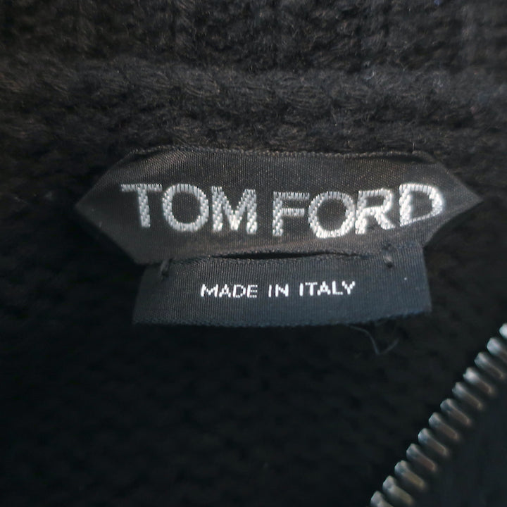 1) Tom Ford diagonal-zip sweater in black cashmere-cotton, pre-owned and gently worn with authentic luxury details 2) Pre-owned Tom Ford diagonal-zip sweater, black cashmere-cotton blend; gently worn luxury knit with original hardware 3) Tom Ford black cashmere-cotton diagonal-zip sweater, pre-owned; gentle wear and authentic designer hardware