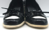 Pre-owned Chanel bow cap-toe pumps in black and white patent leather, authentic, EU 39
