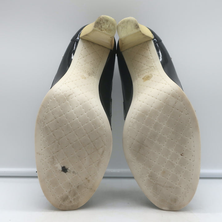 Chanel 06P bow cap-toe pumps in black and white patent leather, authentic pre-owned luxury, EU 39