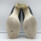 Chanel 06P bow cap-toe pumps in black and white patent leather, authentic pre-owned luxury, EU 39