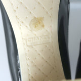 Chanel bow cap-toe pumps, black and white patent leather, size 39, authentic pre-owned pair