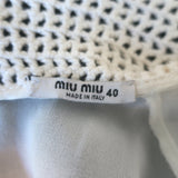 Miu Miu pre-owned bicolor cady mini dress with crochet collar and puff sleeves, black and white, gently worn luxury