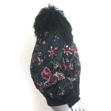 Sacai black floral-embroidered bomber jacket with lamb-fur collar, authentic pre-owned luxury.