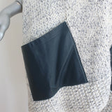 Authentic Maison Ullens leather-pocket wrap shawl in cream wool-blend, pre-owned with light pilling and genuine leather trim.