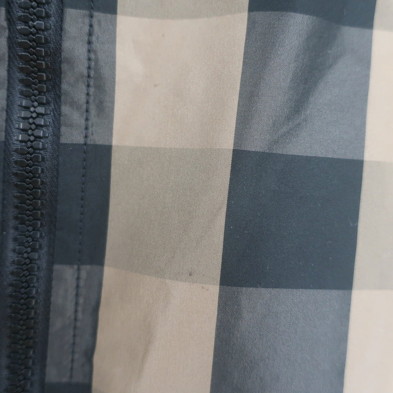 Christian Dior hooded windbreaker, brown and black buffalo-check, size US 4 — authentic pre-owned, gently worn.