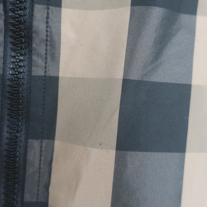 Christian Dior hooded windbreaker, brown and black buffalo-check, size US 4 — authentic pre-owned, gently worn.