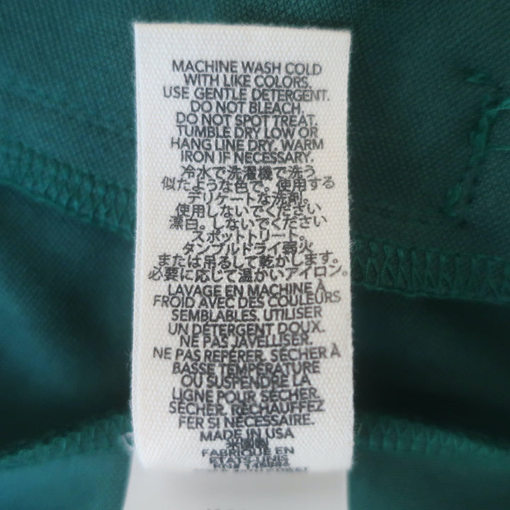 THE GREAT track jacket in clover green and white; authentic pre-owned, gently worn luxury sporty outerwear (Size 1)