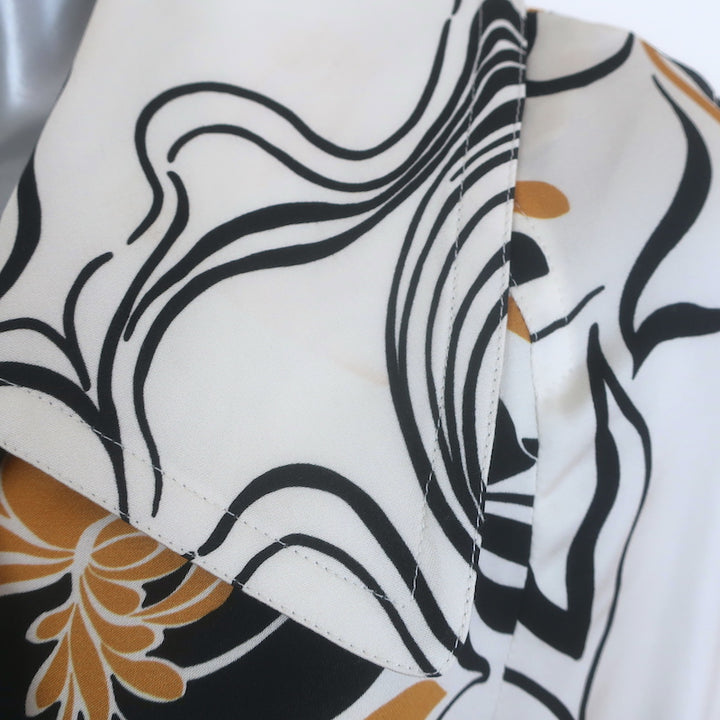 Dries Van Noten Rolana belted trench coat in cream satin with abstract print, gently pre-owned