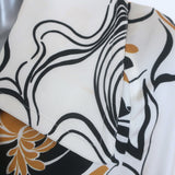 Dries Van Noten Rolana belted trench coat in cream satin with abstract print, gently pre-owned