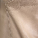 Vince engineered perforated leather jacket in beige, pre-owned luxury piece with authentic designer craftsmanship