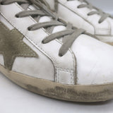 Golden Goose Superstar leather sneakers in white with blue accents, authentic pre-owned luxury pair, gently used