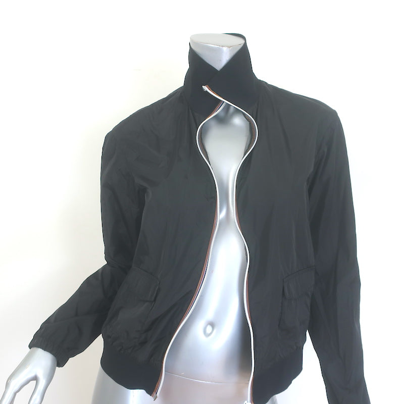 Prada Linea Rossa nylon zip-up jacket in black with graphic patch embellishments, authentic pre-owned