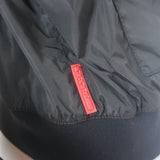 Prada Linea Rossa black nylon zip-up jacket with graphic patch embellishments, authentic pre-owned, size 42