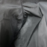 Authentic Prada Linea Rossa nylon zip-up jacket in black with graphic patch embellishments, pre-owned (size 42)