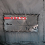 Authentic Prada Linea Rossa black nylon zip-up jacket with graphic patch embellishments, pre-owned