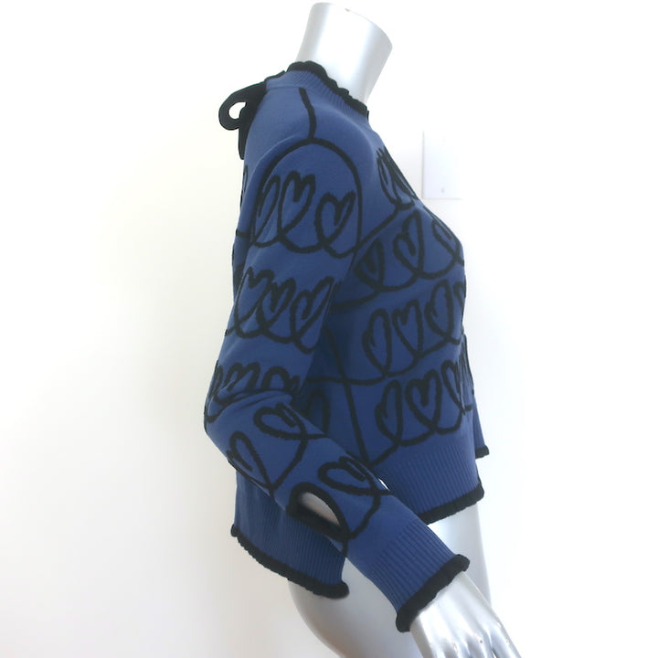 Authentic Fendi scribble heart-embroidered cutout sweater in navy wool-blend, pre-owned luxury item
