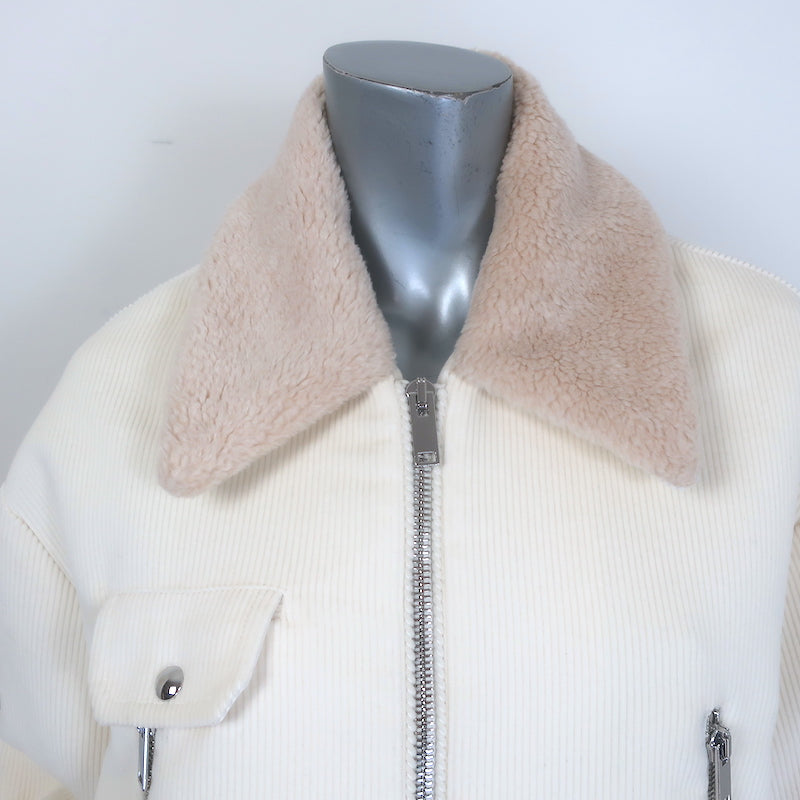 Khaite Flinn cropped corduroy jacket in cream with faux-fur collar, pre-owned, gently worn luxury piece