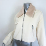 Khaite cropped corduroy jacket with faux fur collar in cream — authentic pre-owned, gently worn luxury designer piece