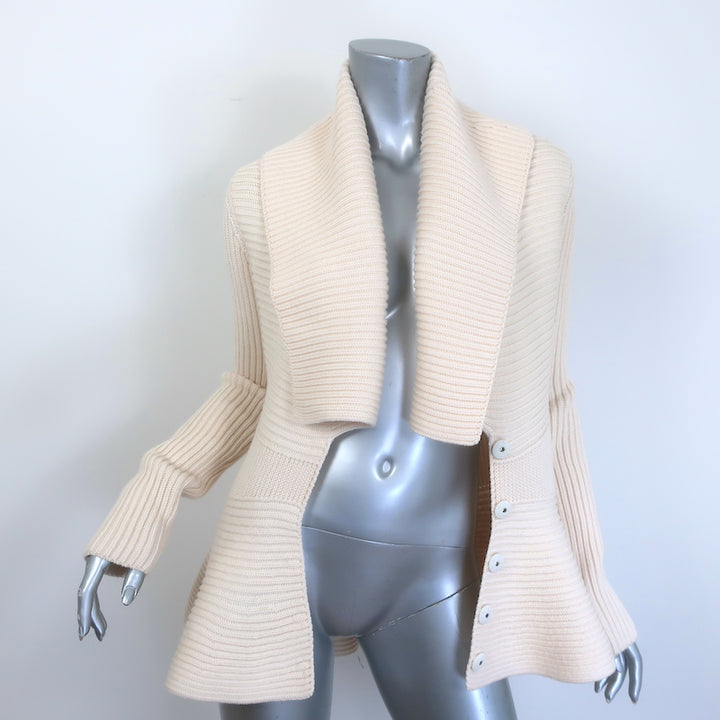 Authentic Alexander McQueen ribbed wool peplum cardigan in ivory, size Large — pre-owned with light wear