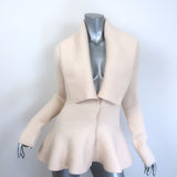 Alexander McQueen ribbed peplum cardigan in ivory wool, authentic pre-owned with minor wear, size L