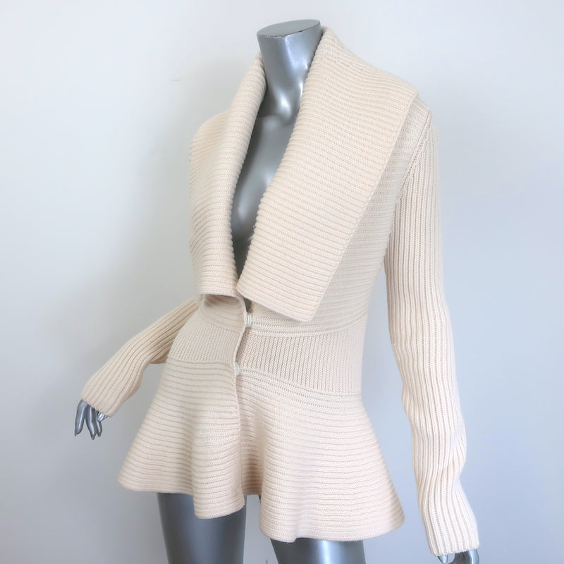 Alexander McQueen ribbed knit peplum cardigan in ivory wool, authentic pre-owned, size L with minor wear