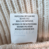 Alexander McQueen ribbed wool peplum cardigan in ivory, pre-owned with minor wear; luxury designer knit, size Large