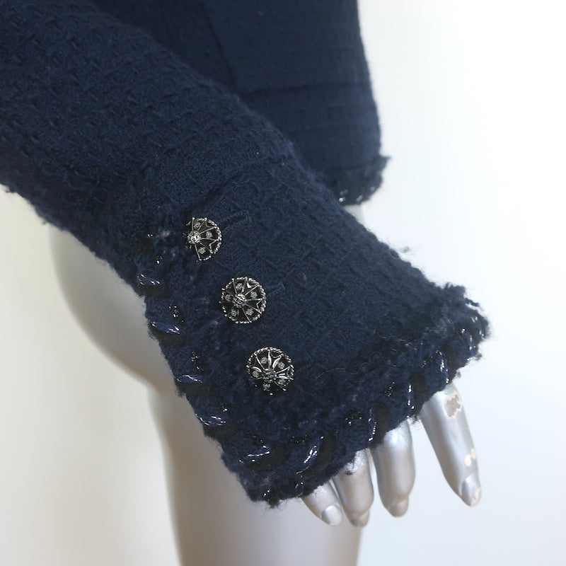 Chanel fringed metallic-trim tweed jacket, navy wool with CC star buttons, authentic pre-owned, size 40