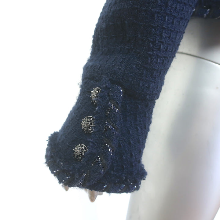 Chanel navy wool tweed jacket with metallic trim and CC star buttons, authentic pre-owned, gently worn, size 40
