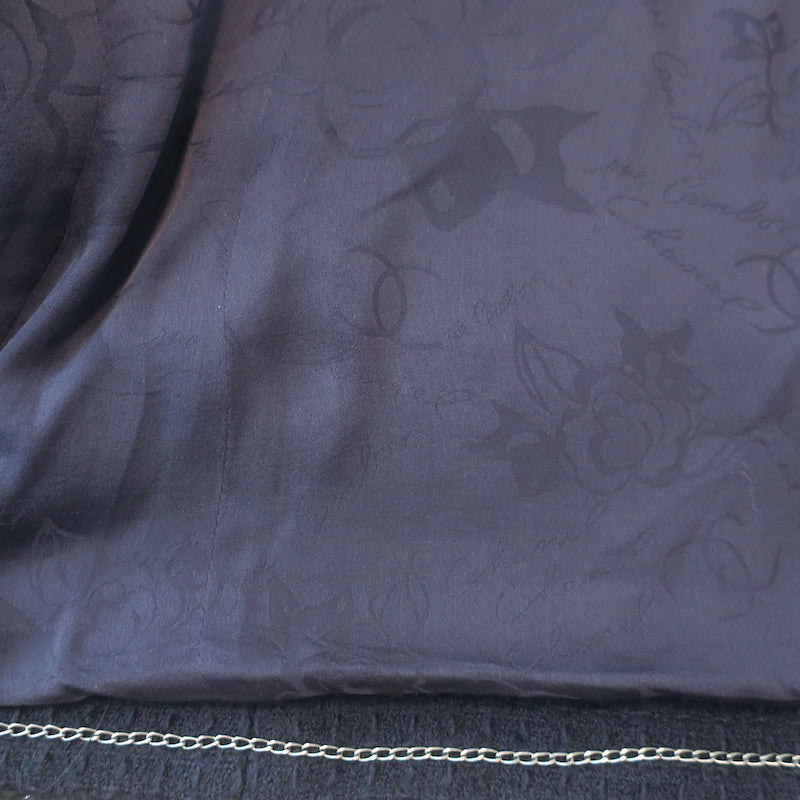 Chanel tweed jacket in navy wool with CC star buttons and metallic trim, pre-owned, size 40