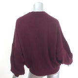 Khaite Margaux cashmere blouson-sleeve sweater in merlot, gently pre-owned luxury piece, size small
