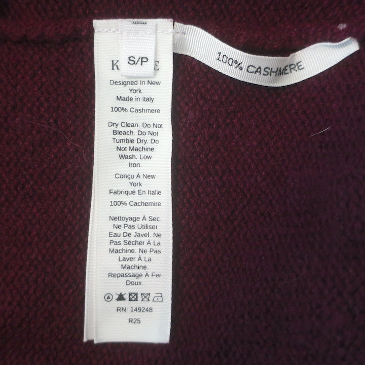 Authentic Khaite Margaux cashmere blouson-sleeve sweater in merlot, pre-owned and gently worn, size small.