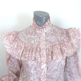 The Vampire's Wife Frill Seeker ruffled blouse, white with red botanical print, authentic pre-owned, size 6