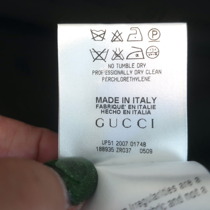 Gucci 2007 button-front jacket, black stretch hemp, size 44, pre-owned luxury with authentic vintage appeal.