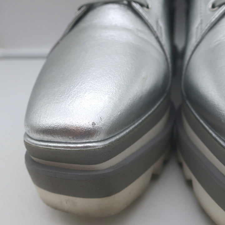 Stella McCartney Elyse platform sneakers in silver faux leather, authentic pre-owned, EU 39