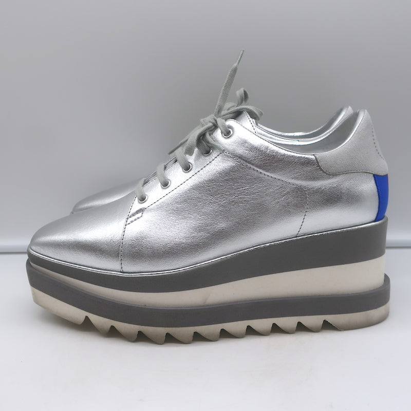 Stella McCartney Sneak Elyse platform sneakers, silver faux leather—authentic pre-owned with light wear