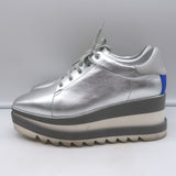 Stella McCartney Sneak Elyse platform sneakers, silver faux leather—authentic pre-owned with light wear