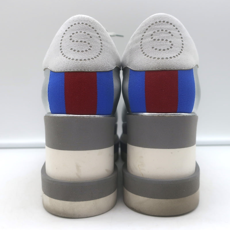 Stella McCartney Sneak Elyse platform sneakers, silver faux leather — authentic pre-owned, good condition