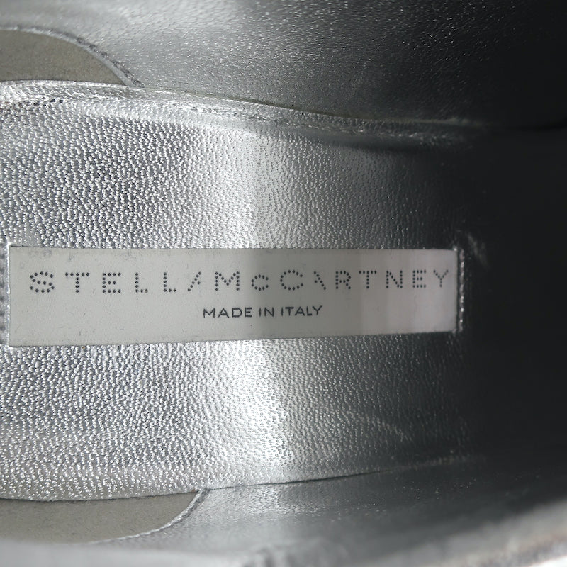 Stella McCartney Sneak Elyse platform sneakers in silver faux leather, authentic pre-owned luxury