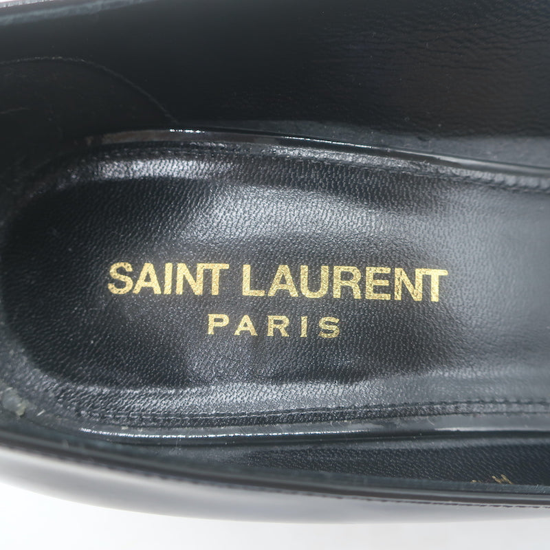 Saint Laurent Kiki pointed-toe kitten heel pumps in black patent leather, pre-owned, authentic luxury with gentle wear.