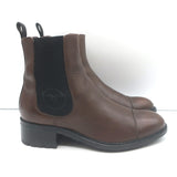 Authentic Chanel cap-toe CC Chelsea boots in dark brown leather, pre-owned with light scuffs