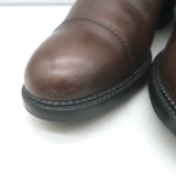 Chanel cap-toe CC Chelsea boots in dark brown leather, pre-owned with refined patina