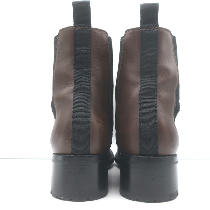 Chanel cap-toe CC Chelsea boots in dark brown leather — authentic, pre-owned luxury women&