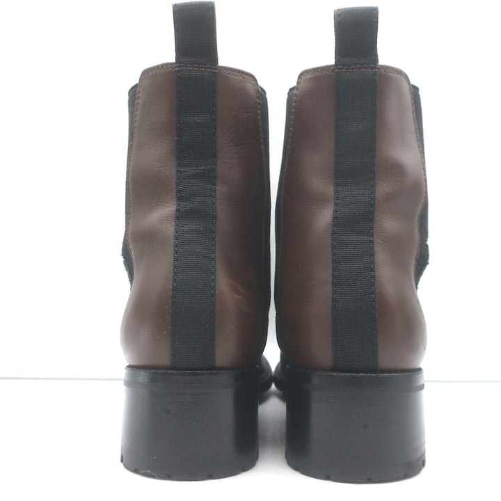 Chanel cap-toe CC Chelsea boots in dark brown leather — authentic, pre-owned luxury women&