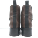 Chanel cap-toe CC Chelsea boots in dark brown leather — authentic, pre-owned luxury women's boots