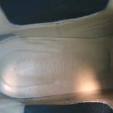 Authentic Chanel cap-toe CC Chelsea boots, dark brown leather, pre-owned with light wear