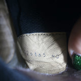 Authentic pre-owned Chanel cap-toe CC Chelsea boots in dark brown leather with elegant patina